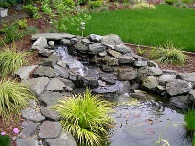 Soothing sounds of water bubbling make relaxing on the deck a pleasure.