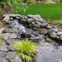 Soothing sounds of water bubbling make relaxing on the deck a pleasure.