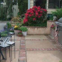 Outdoor kitchen between main patio and deck.