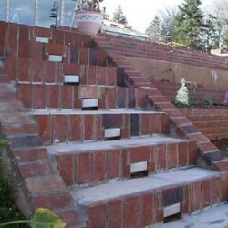 Brick steps to path on bluff.